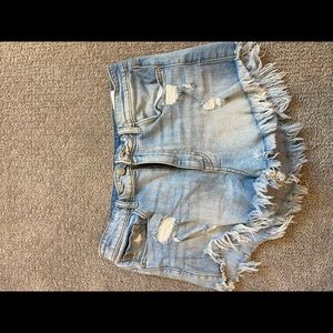 Distressed light washed Jean shorts